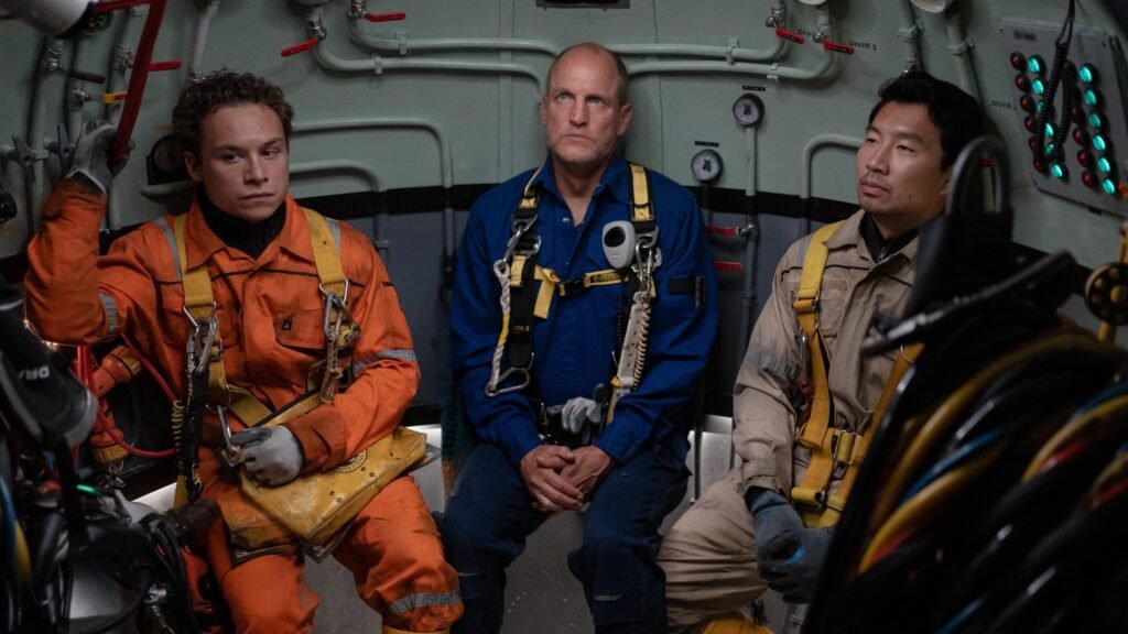 Finn Cole, Woody Harrelson and Simu Liu as saturation divers in the new survival thriller ‘Last Breath’.